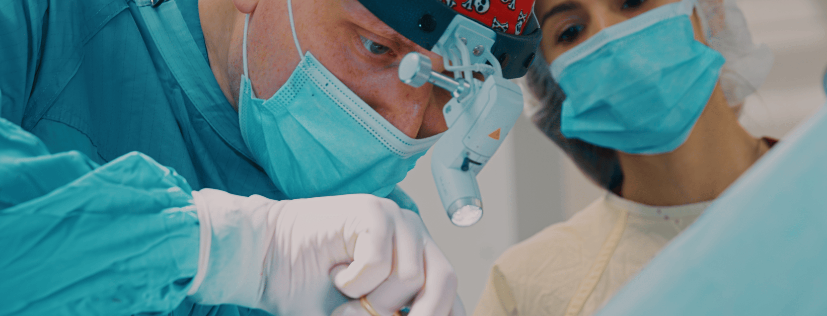dentist performing oral surgery