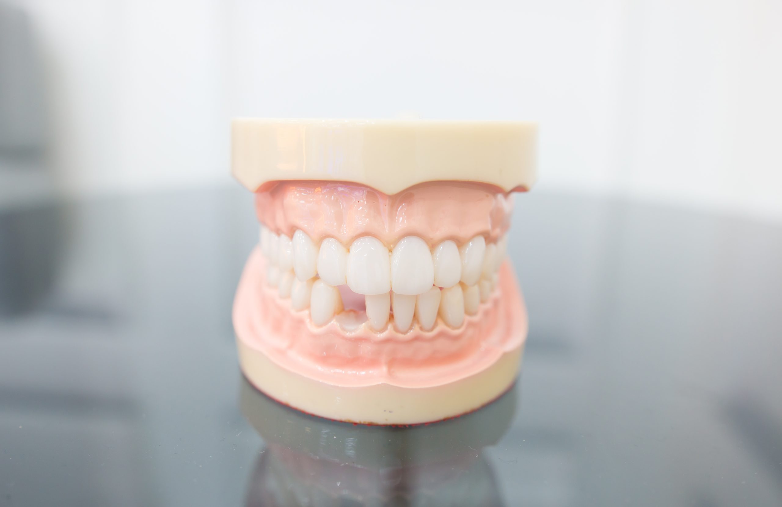 Close up picture mouth with a missing tooth.